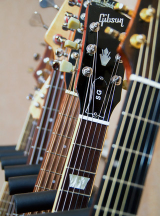 liff Smith Guitar Lessons, detail of guitar headstocks