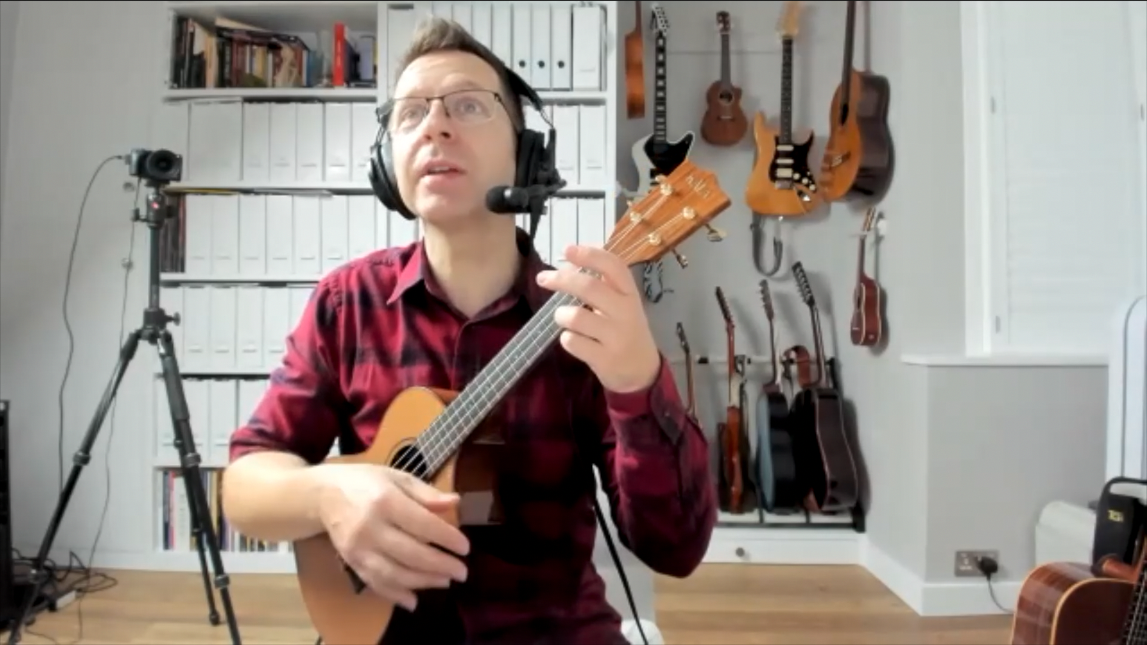 Ukulele teacher with ukulele on Zoom