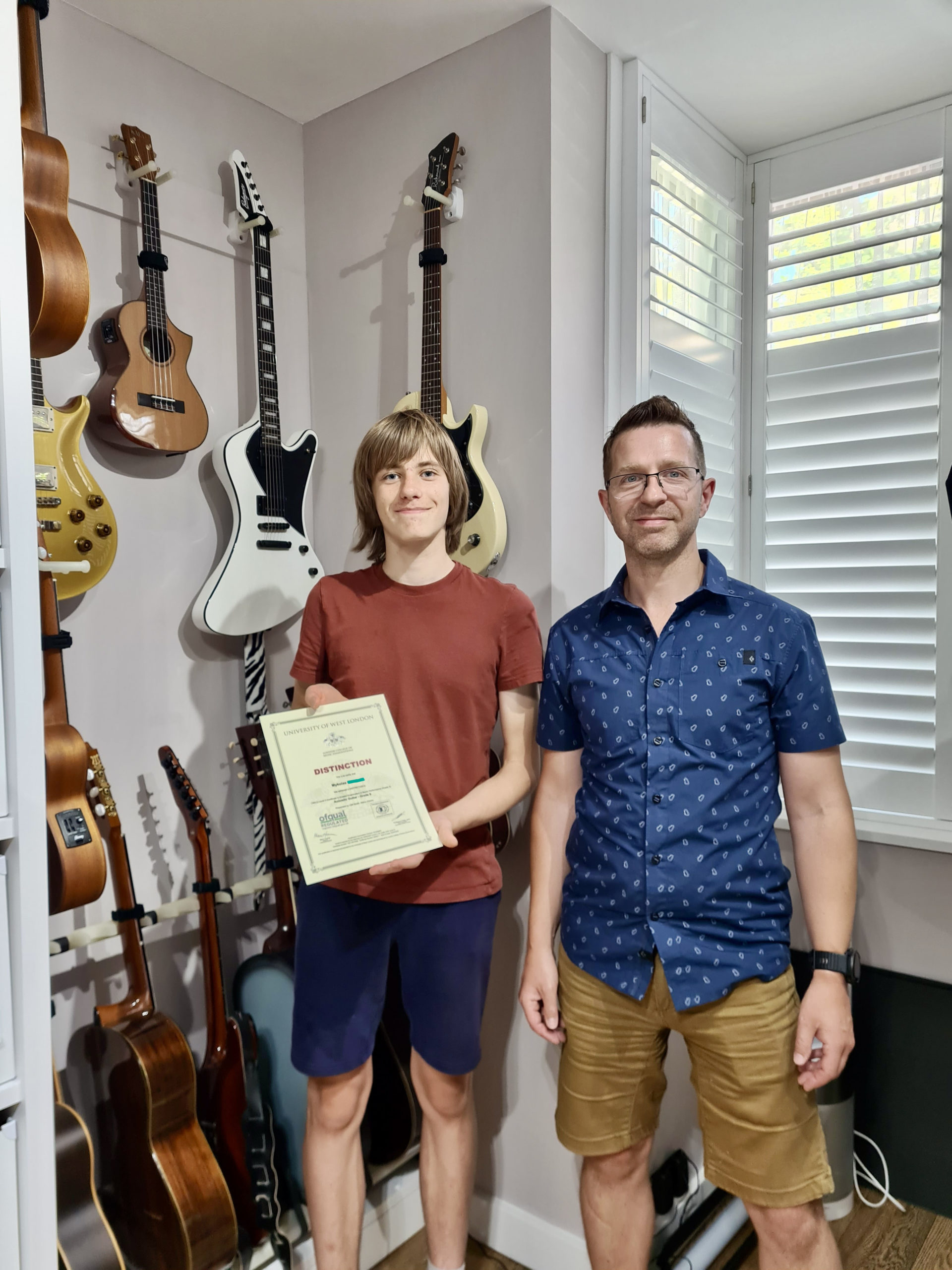 Grade 8 LCM acoustic guitar exm distinction pupil age 14